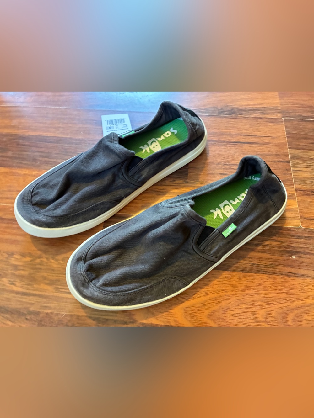 Sanuk Black Slip-On Canvas Shoe with Green Accent